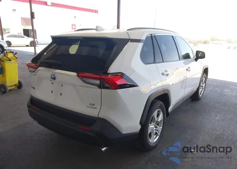 2021 Toyota Rav4 Hybrid Le from USA, damaged, VIN JTMMWRFV1MD129239